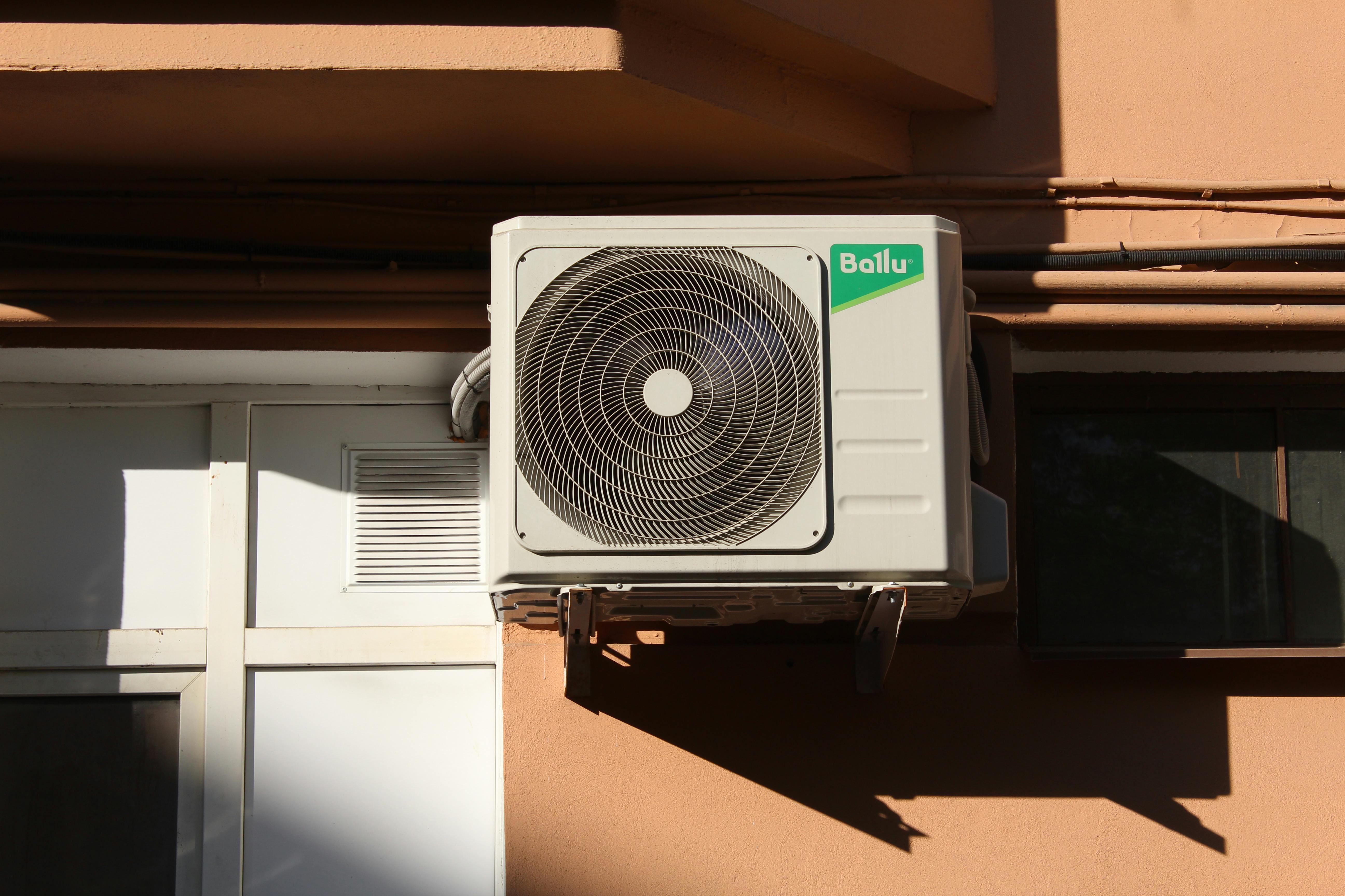 High-efficiency Ballu air conditioning unit installed on residential building
